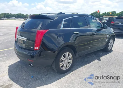2014 Cadillac Srx Luxury Collection z USA, uszkodzony, nr VIN 3GYFNBE33ES587444